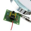 Helping Hands with Magnifying Glass