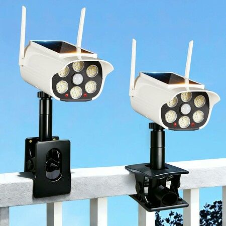 2 Pack Clip On Solar Fake Security Cameras with Light, Motion Sensor Outdoor Lights, Dummy Surveillance Camera for Gutter Fence Garages Warehouses