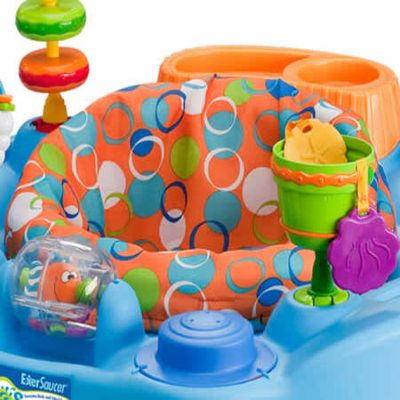 Exersaucer splash outlet