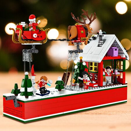 940pcs Creative Christmas Santa Claus Flying Party Sets Model  Building Blocks Diy Bricks Kids Gift Toys