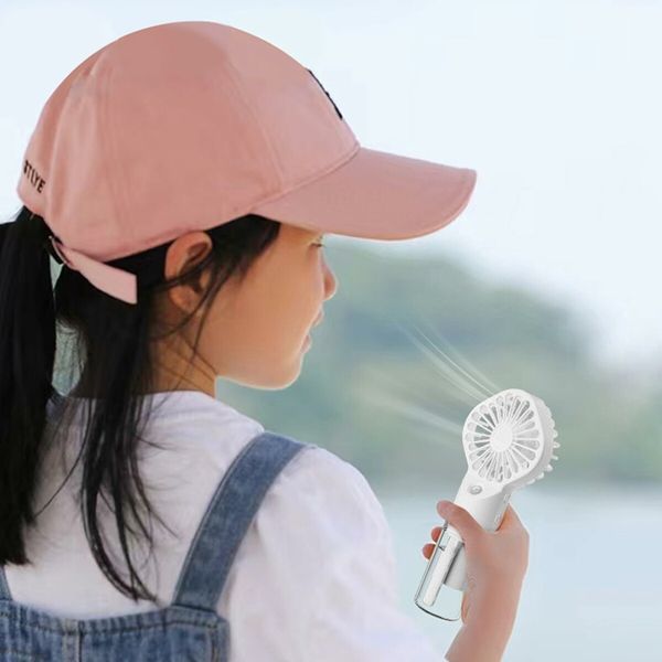 Portable Fan, Handheld Fan with Water Mist Spray Desk Fan 4 Speed Face Steamer Fan USB Spray Cooling Fans with Clear Water Tank for Outdoor Indoor White