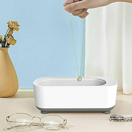 Efficient Ultrasonic Jewelry Cleaner Deep cleans dentures, glasses, watches for optimal hygiene