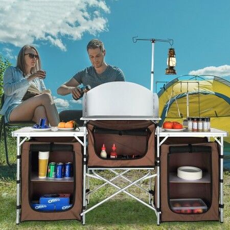 Camping Kitchen Table Folding Outdoor Cooking Table with Storage Carrying Bag Aluminum Cook Station 3 Cupboard & Detachable Windscreen Quick Set-up