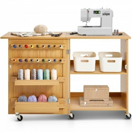 Folding Sewing Table with Lockable Wheels Shelves Trays Door Wood Color